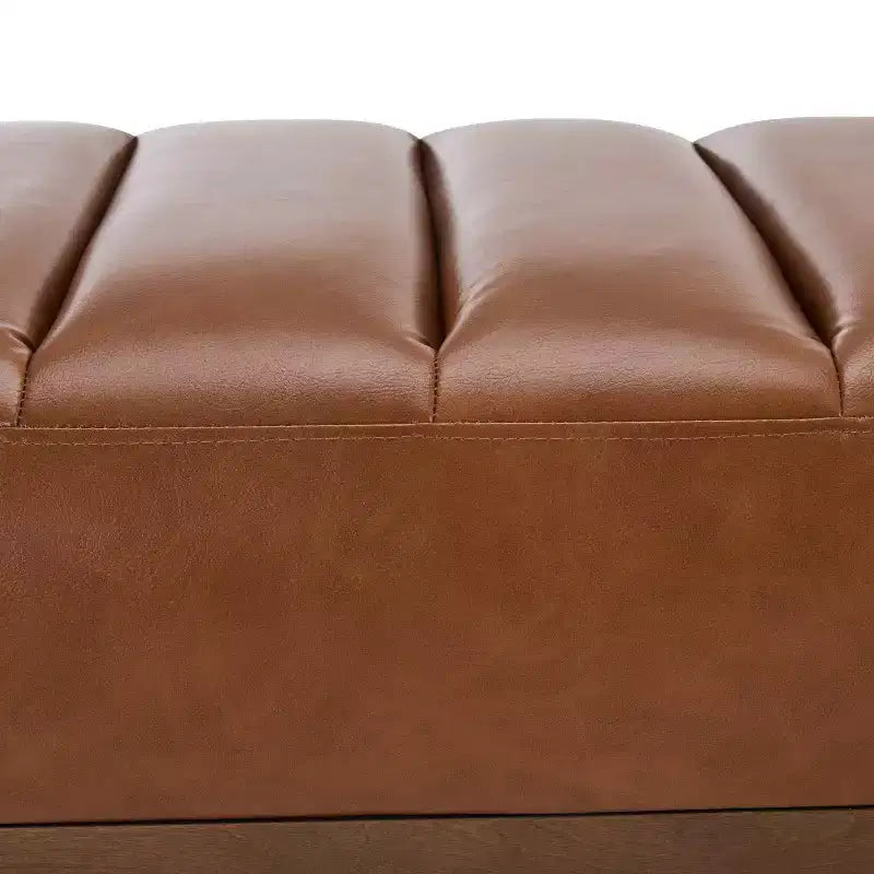 Pouffe matelassé moderne en similicuir 55 W avec base dorée